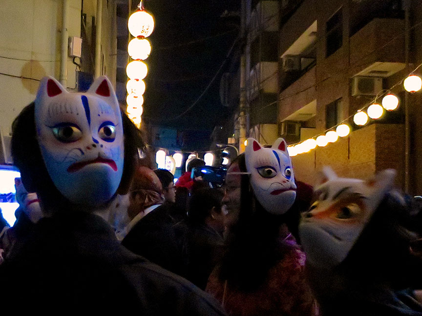 Participants and spectators alike wear fox masks, but the thing I love about this festival is that under the fox masks people are wearing...fox makeup!