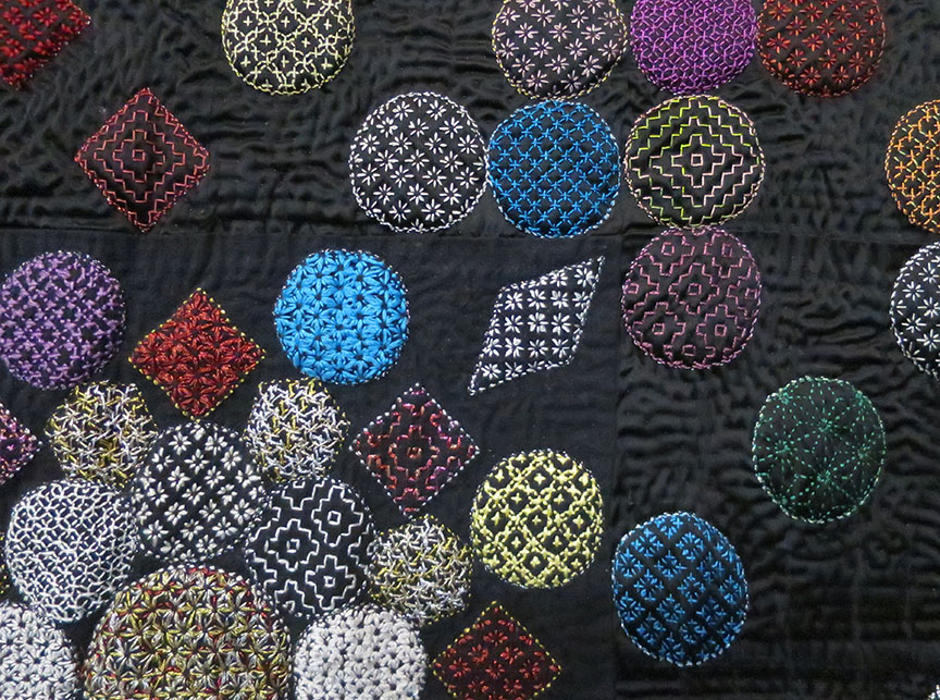 ...hand-embroidered, using traditional Japanese sashiko techniques. O_O ("Flower Embroidery" by ??)