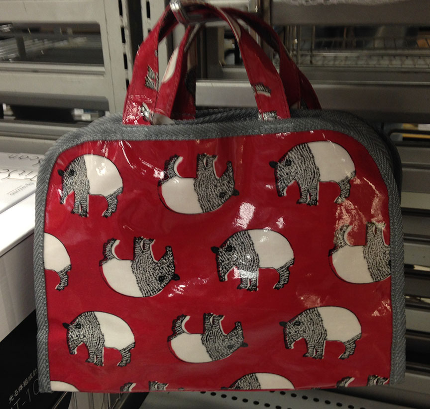 Prehensile-nosed mammals snuffling about on a Shibuya Loft cosmetics bag