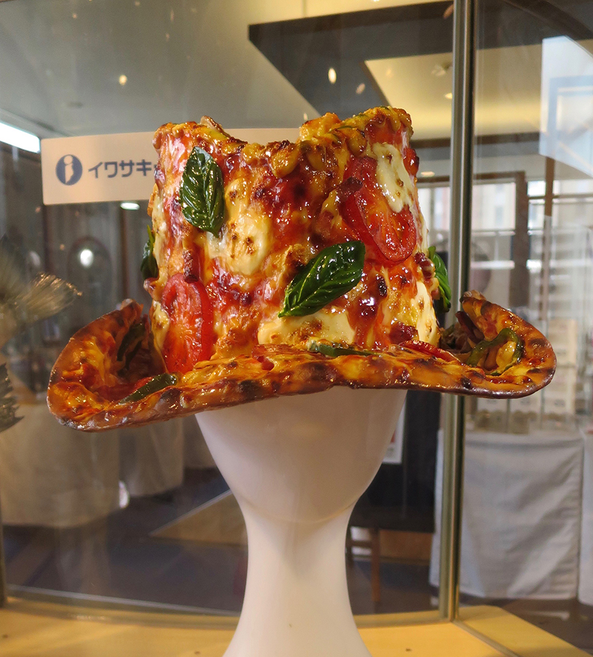 ...and a pizza hat. Wait, a PIZZA HAT? (It was XX who dreamed up this one.)