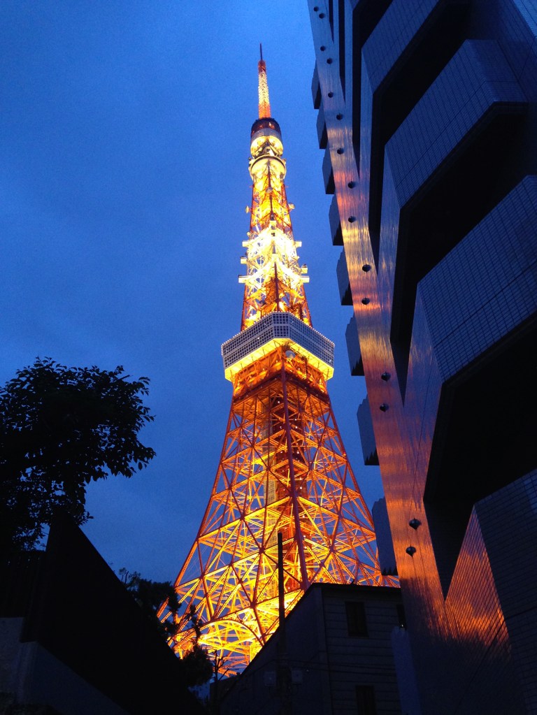 Tokyo Tower lit up at twilight