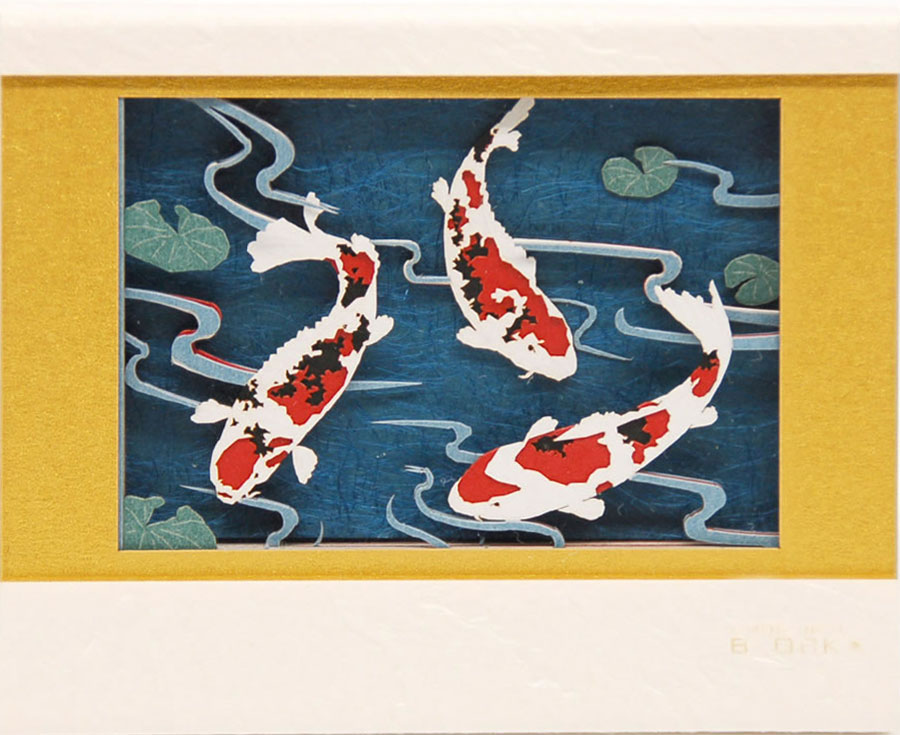 Notepad from Omoshiroi online store that reveals koi fish as it's used