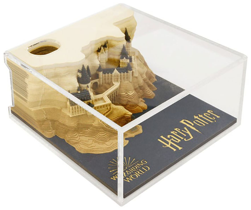Notepad from Omoshiroi online store that reveals Hogwarts castle as it's used in clear case